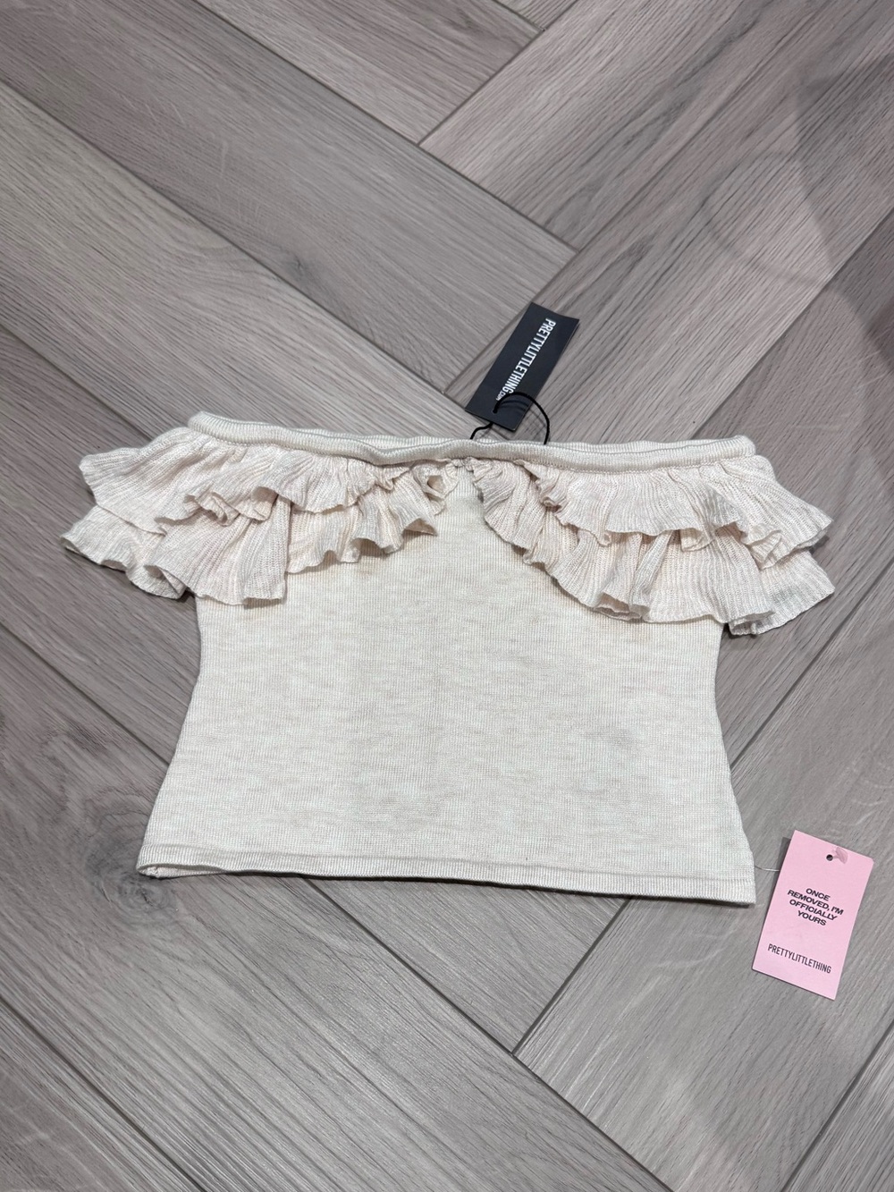 PRETTYLITTLETHING Cream strapless Ruffle Knit Top
